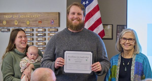 Jonah Vandel, center, holds the Excellence in Leadership Award with Alexa and Vera Vandel, left, and Peg Strickland during the third annual Ministry Appreciation and Awards Luncheon on Oct. 18 at Weston United Methodist Church.